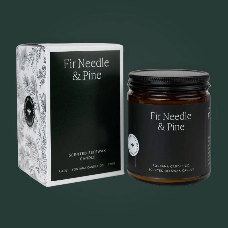 Beeswax jar candle with Fir & Pine Essential Oil, amber glass, black lid and dark evergreen label in a printed box.