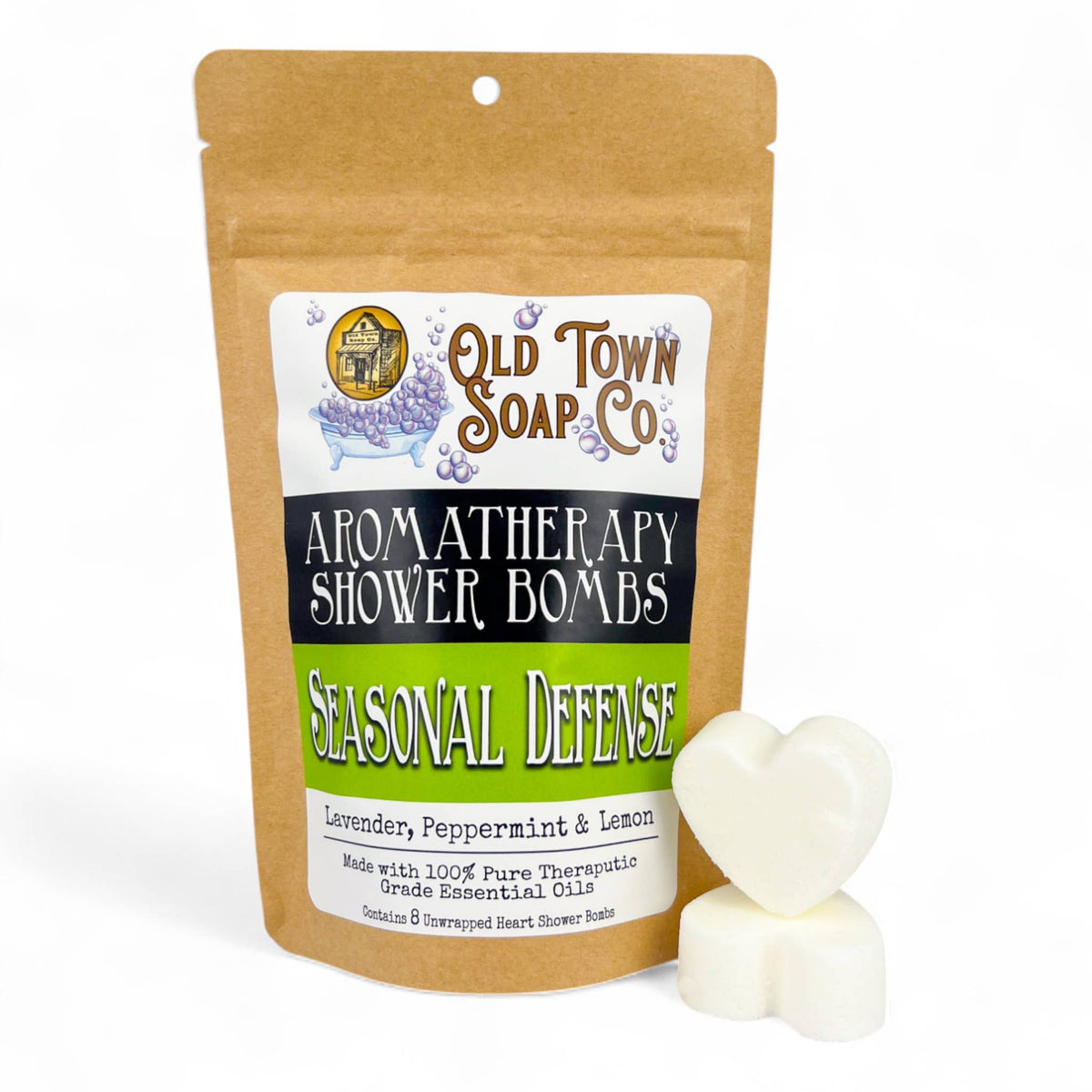Shower Bombs/Steamers in a brown kraft pouch, with two white heart-shaped tablets and a green Seasonal Defense label.