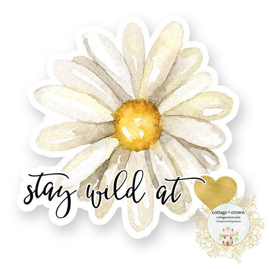 Vinyl decal sticker with a watercolor-style white daisy, golden center, black script, and gold heart; Stay Wild At Heart.